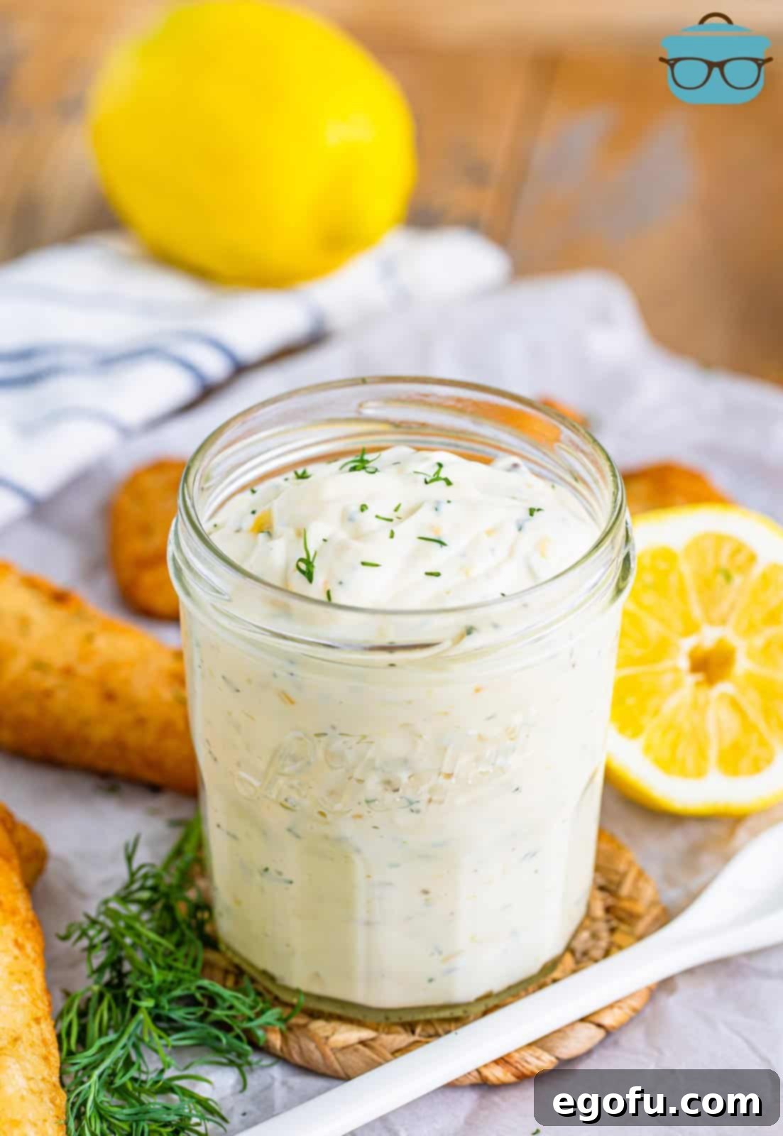 Tangy Homemade Tartar Sauce 7 A charming glass jar filled with freshly made homemade Tartar Sauce, ready for storage or serving.