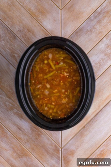 A slow cooker of green beans.