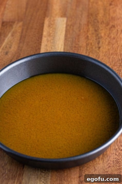 Brown sugar butter mixture on the bottom of a springform pan.