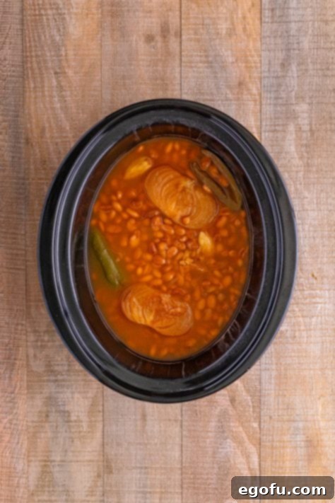 Cooked beans in a slow cooker.