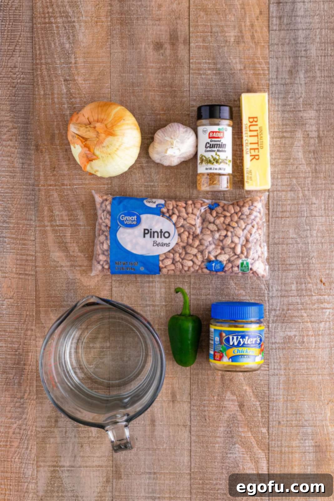 Dried pinto beans, butter, onion, jalapeno, water, chicken bouillon, garlic, and cumin.