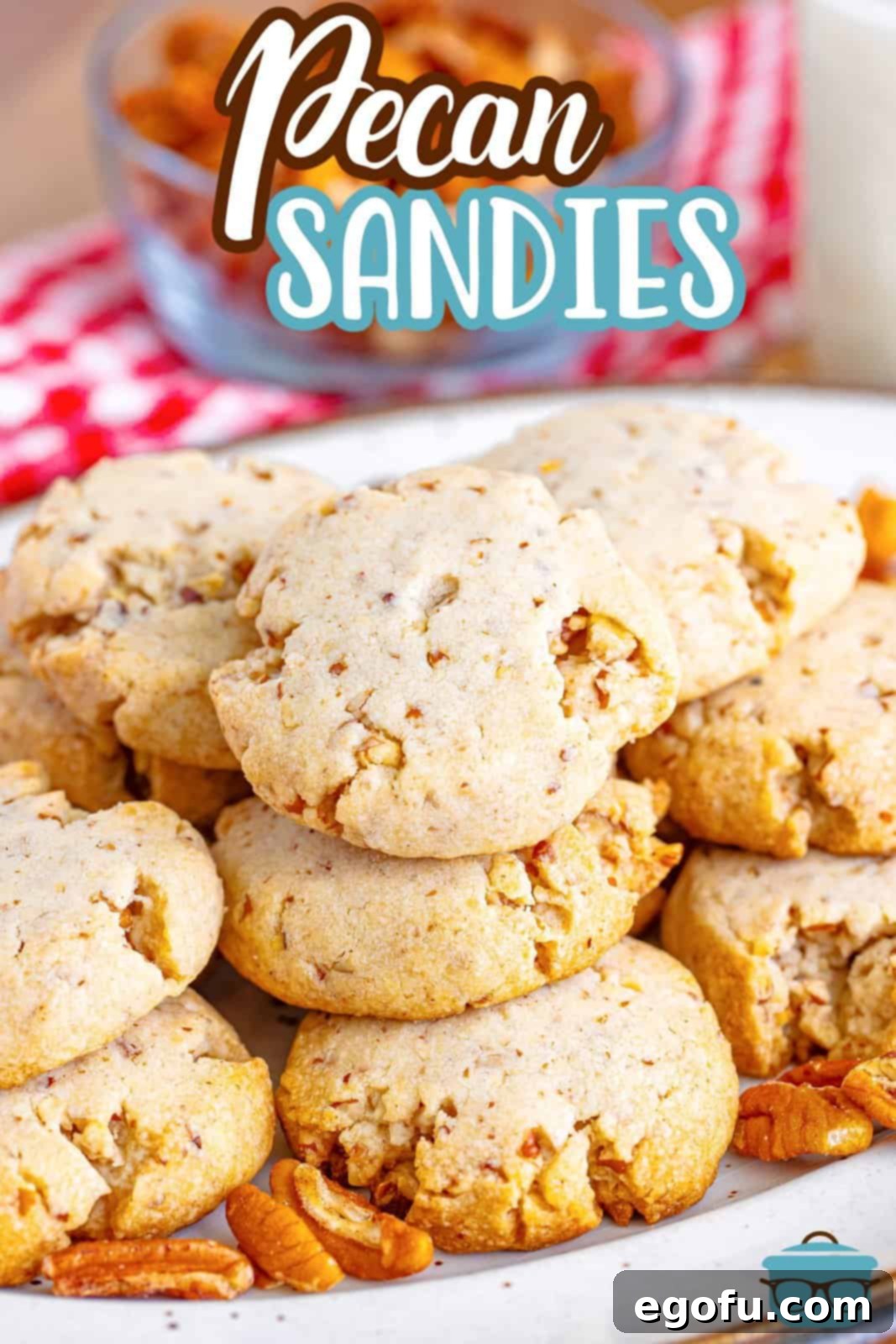 A close-up view of homemade Pecan Sandies cookies arranged on a plate, showcasing their inviting golden-brown hue and visible pecan pieces.