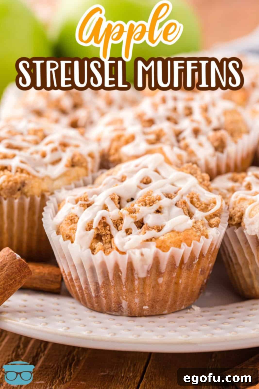 A plate brimming with warm, delicious Apple Streusel Muffins, ready to be enjoyed.