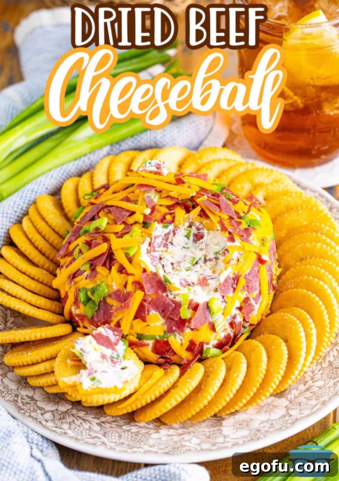 Savory Beef Cheese Delight 3 A close-up view looking down on a perfectly formed dried beef cheeseball, showing a bite taken out, highlighting its creamy interior and textured exterior.