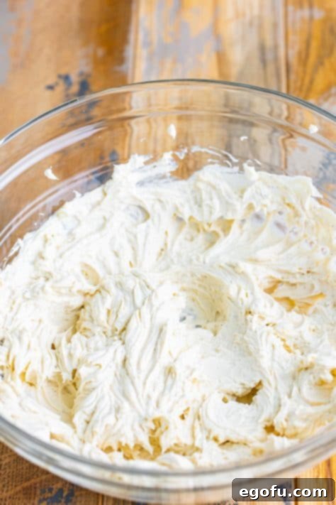 Savory Beef Cheese Delight 10 Cream cheese, Worcestershire sauce, pepper, garlic powder, and onion powder in a large bowl.