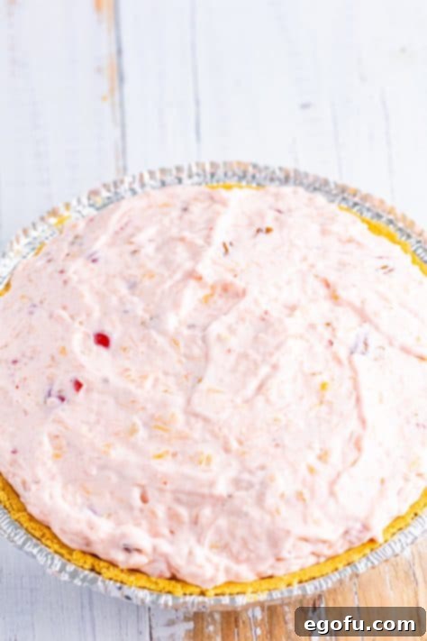 Graham cracker crust with millionaire pie filling inside.