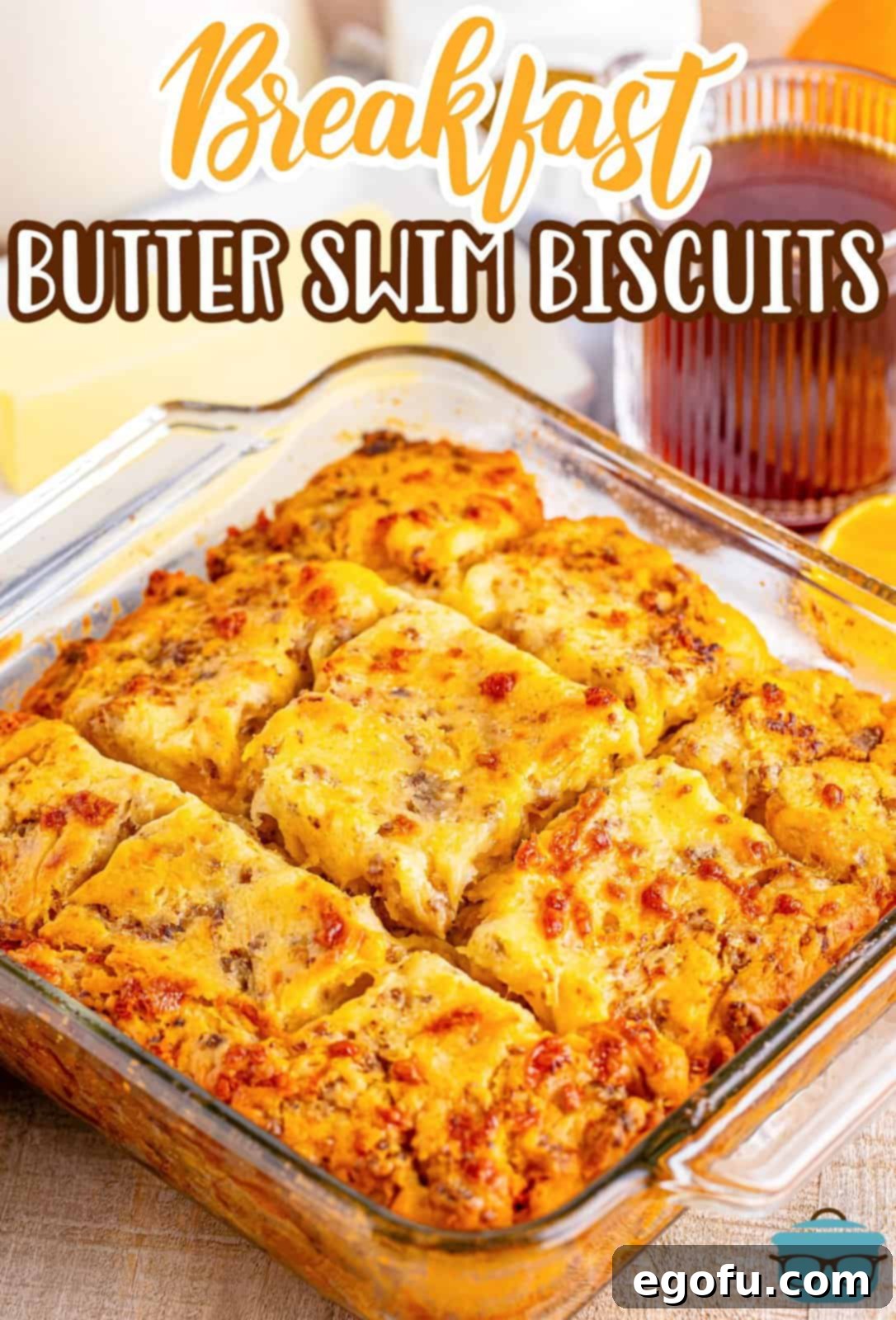 A baking dish with Breakfast Butter Swim Biscuits cut into squares.