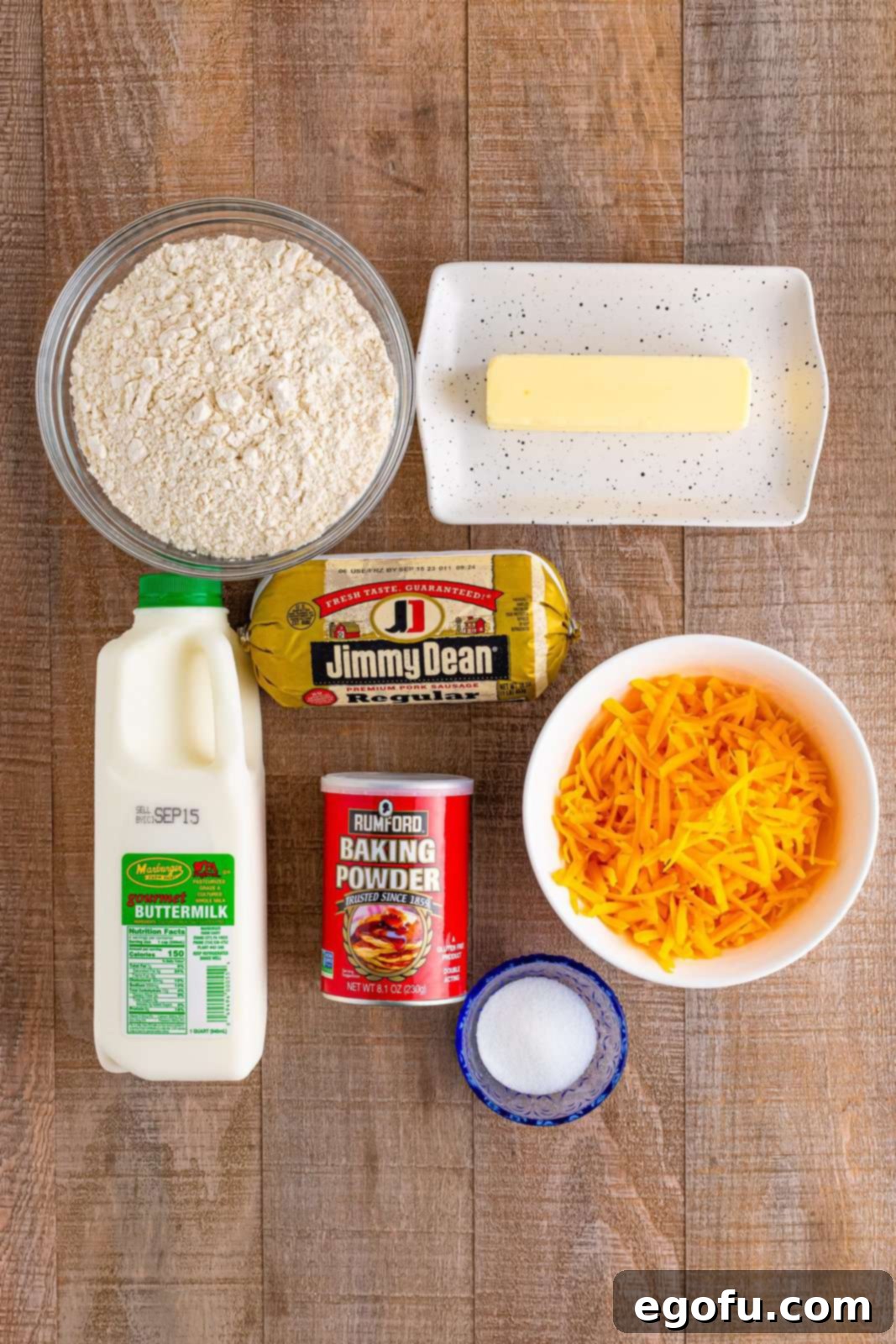 All purpose flour, butter, breakfast sausage, shredded cheese, baking powder, buttermilk, and granulated sugar.