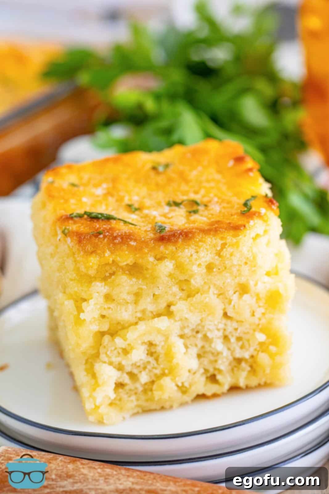 Garlic Butter Bath Biscuits 8 A few small serving plates, each holding a perfectly portioned Garlic Butter Swim Biscuit, ready to be enjoyed.