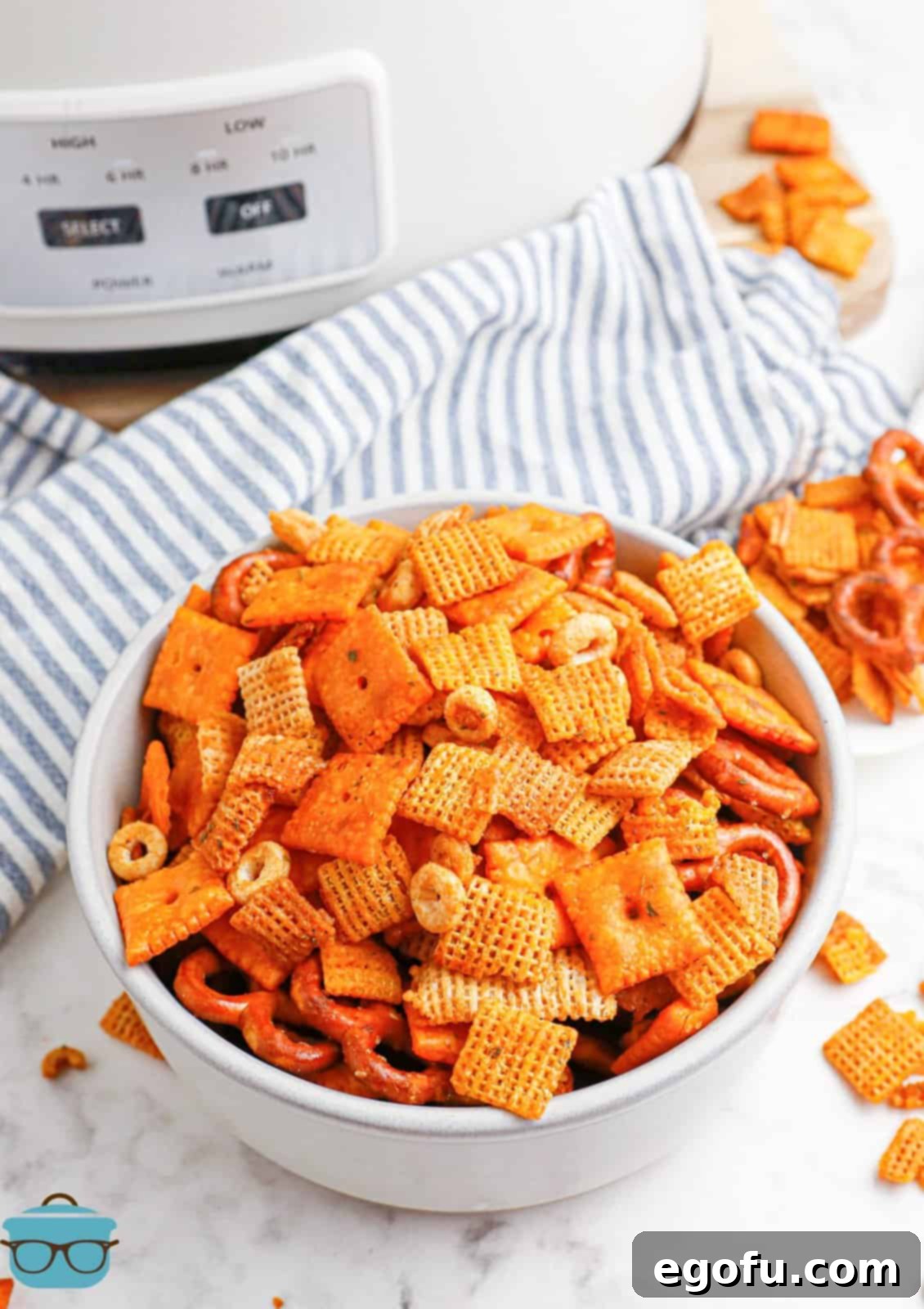 Ultimate Slow Cooker Buffalo Ranch Chex Mix 6 A inviting bowl overflowing with the finished Crock Pot Buffalo Ranch Chex Mix, ready for sharing.