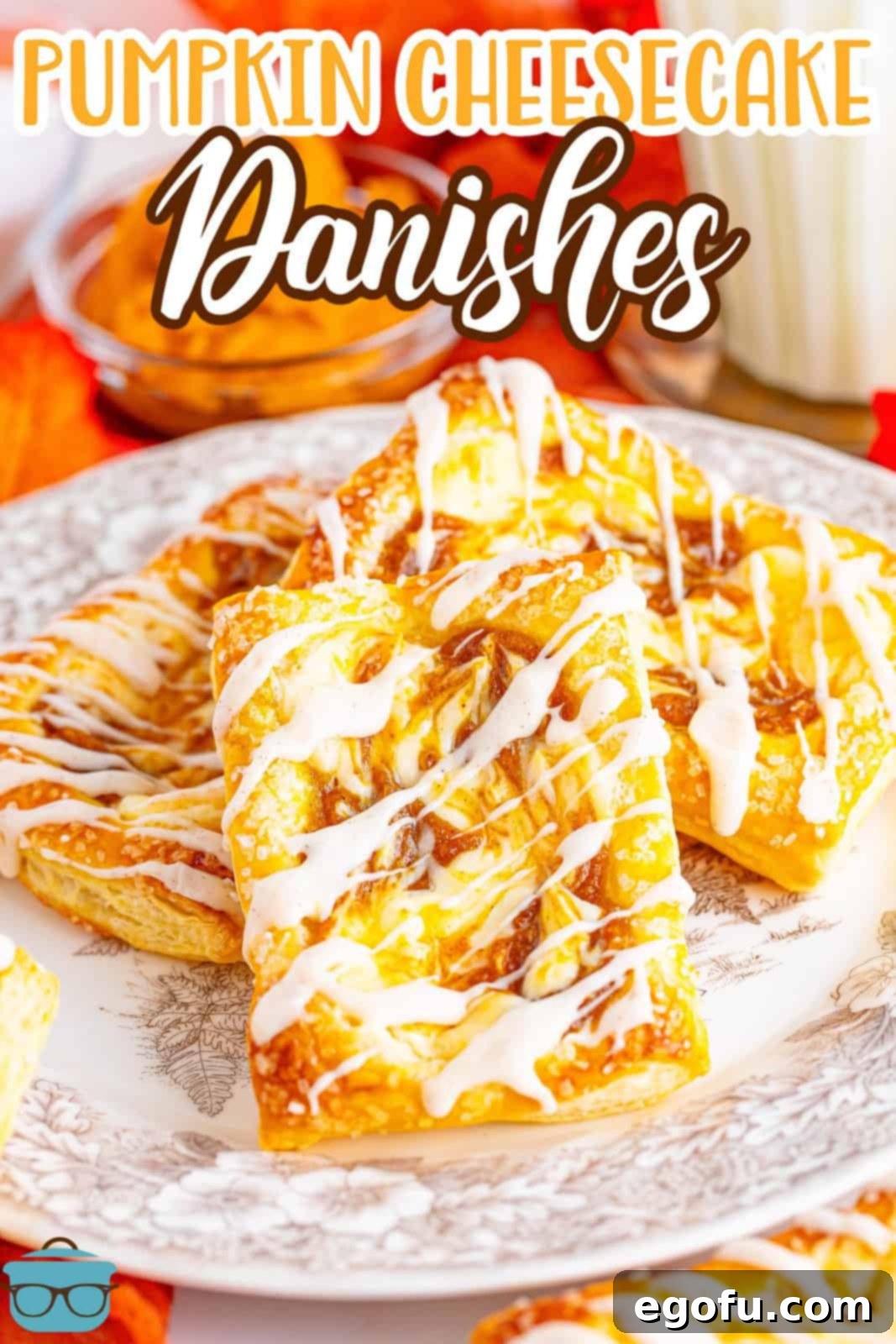 A beautifully arranged plate of pumpkin cheesecake danishes, ready to be served.