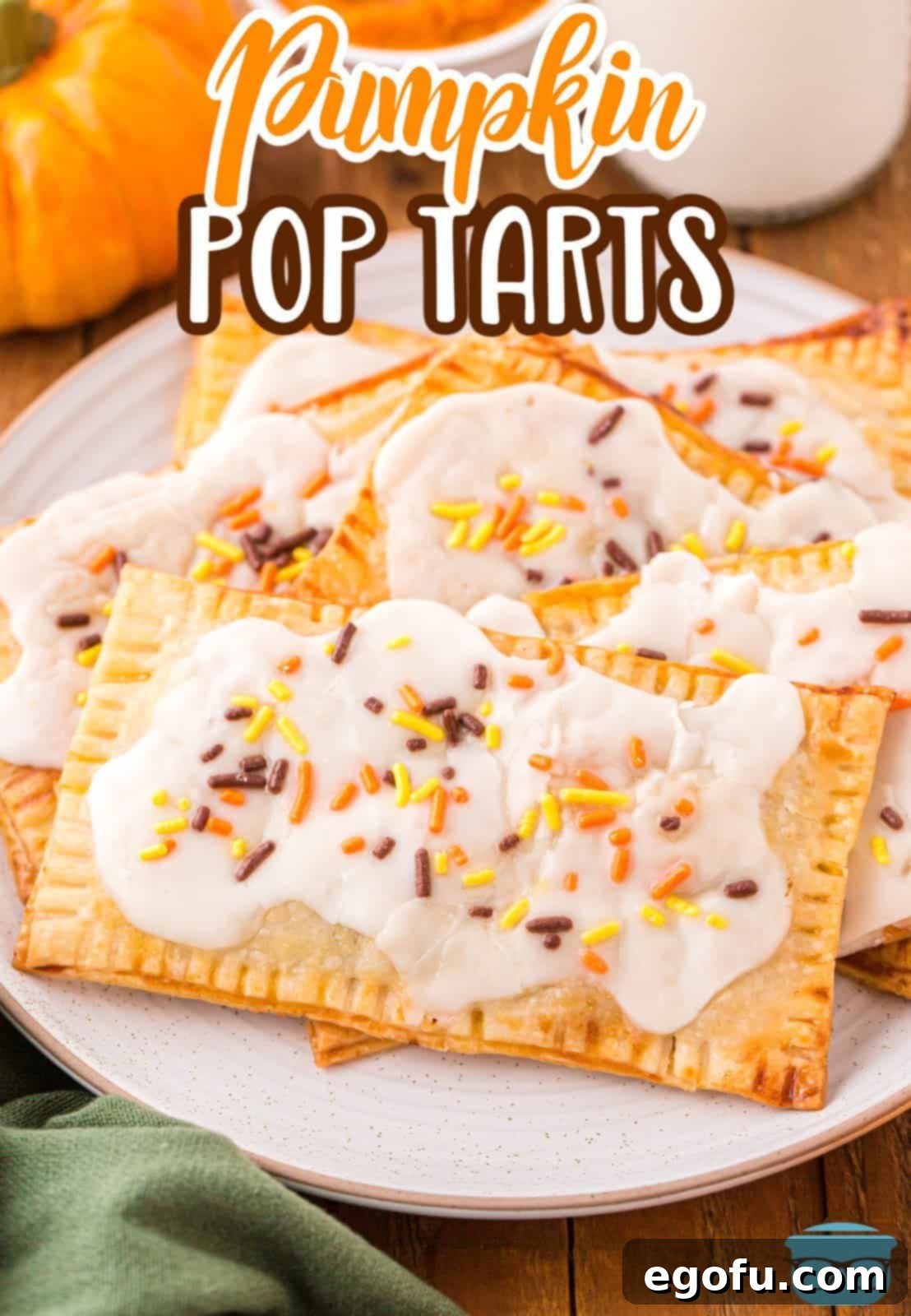 A beautiful plate showcasing freshly baked Pumpkin Pop Tarts, perfectly glazed and ready to be served.
