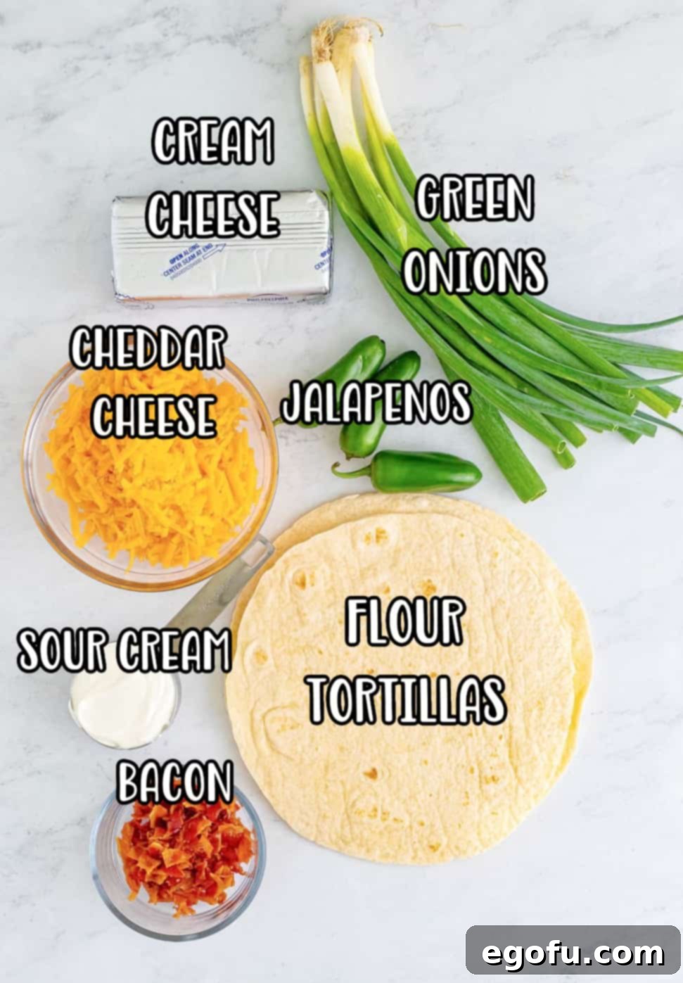 Cream cheese, sour cream, green onions, cheddar cheese, tortillas, jalapenos, and bacon.