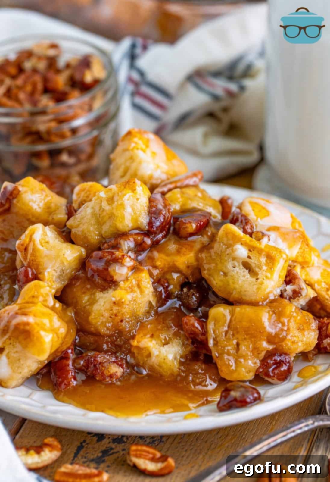 Gooey Pecan Pull-Apart Bake 2 A plate of Pecan Bubble Up, showcasing its gooey texture and golden-brown biscuits.