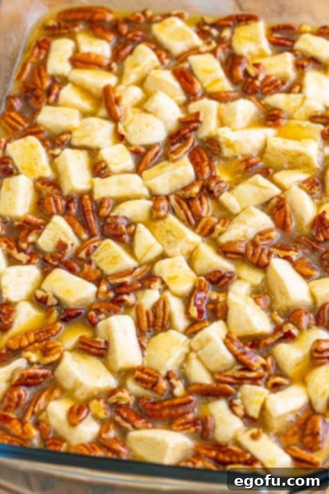 Gooey Pecan Pull-Apart Bake 14 A baking dish with some unbaked pecan pie bubble up.
