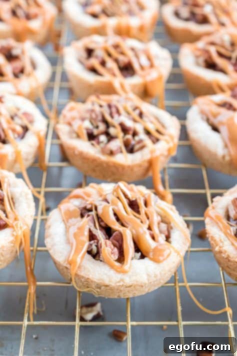 Cookie cups with chocolate, nuts and caramel drizzle.