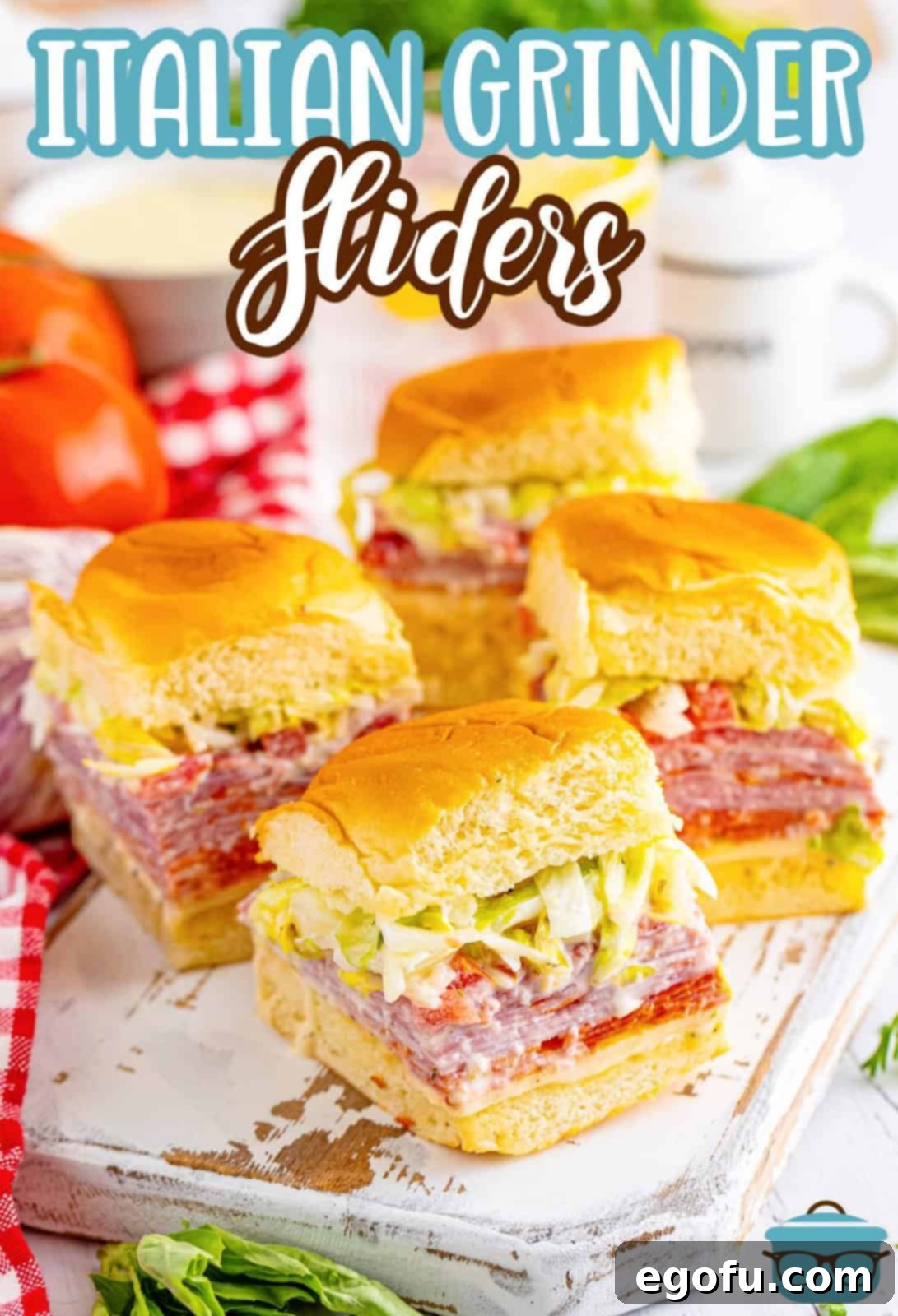 A vibrant platter brimming with perfectly arranged mini Italian Grinder Sliders, ready to be served.