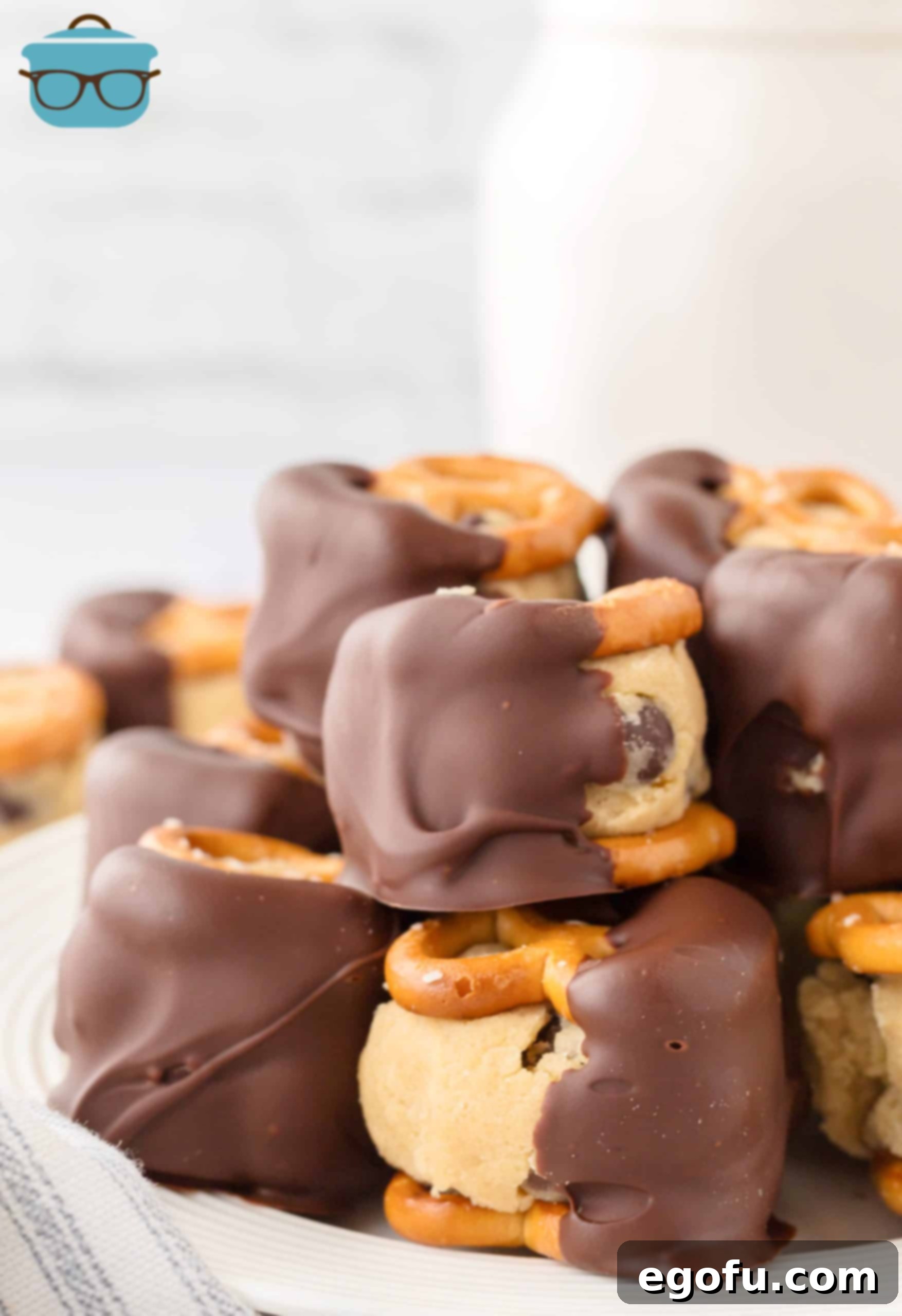 A pile of Cookie Dough Pretzel Bites on a plate.