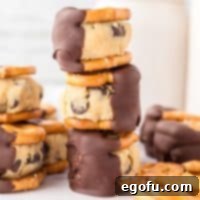 Close up looking at a few chocolate covered Cookie Dough Pretzel Bites.