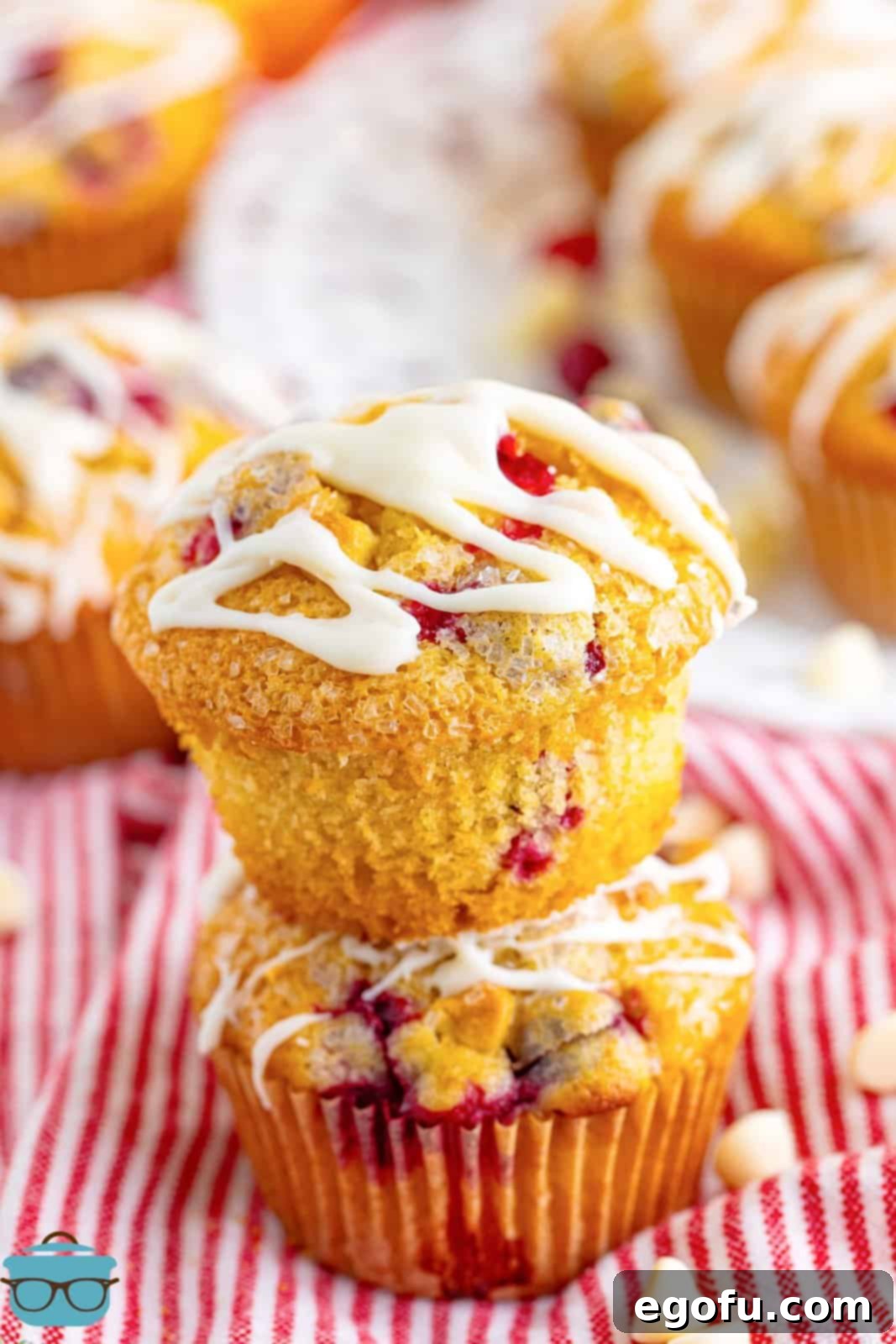 Two Cranberry Bliss Muffins in a pile.