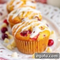 Close up looking at a few Cranberry Bliss Muffins.