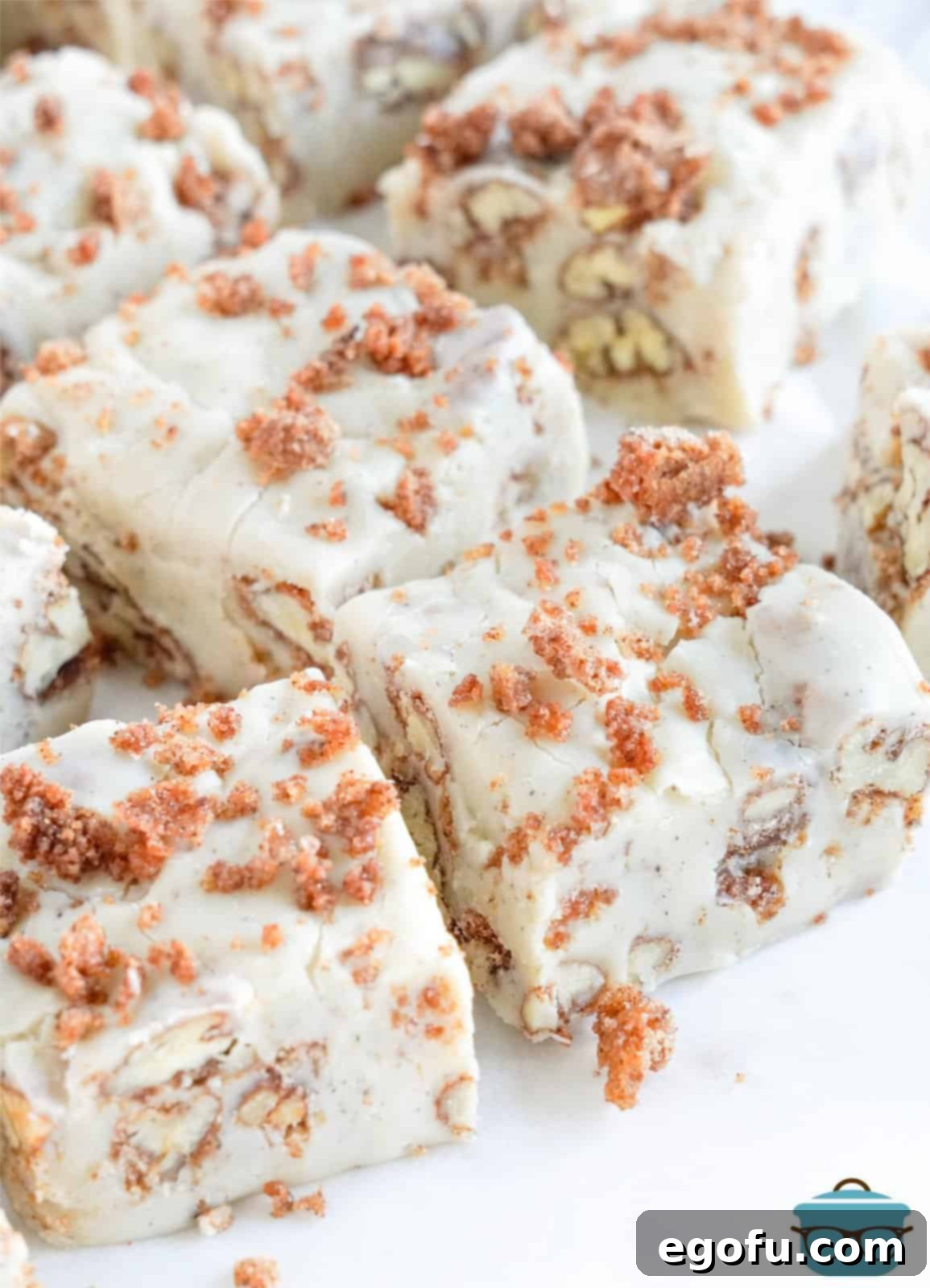 A few pieces of Candied Pecan Fudge cut into neat squares, ready for serving.