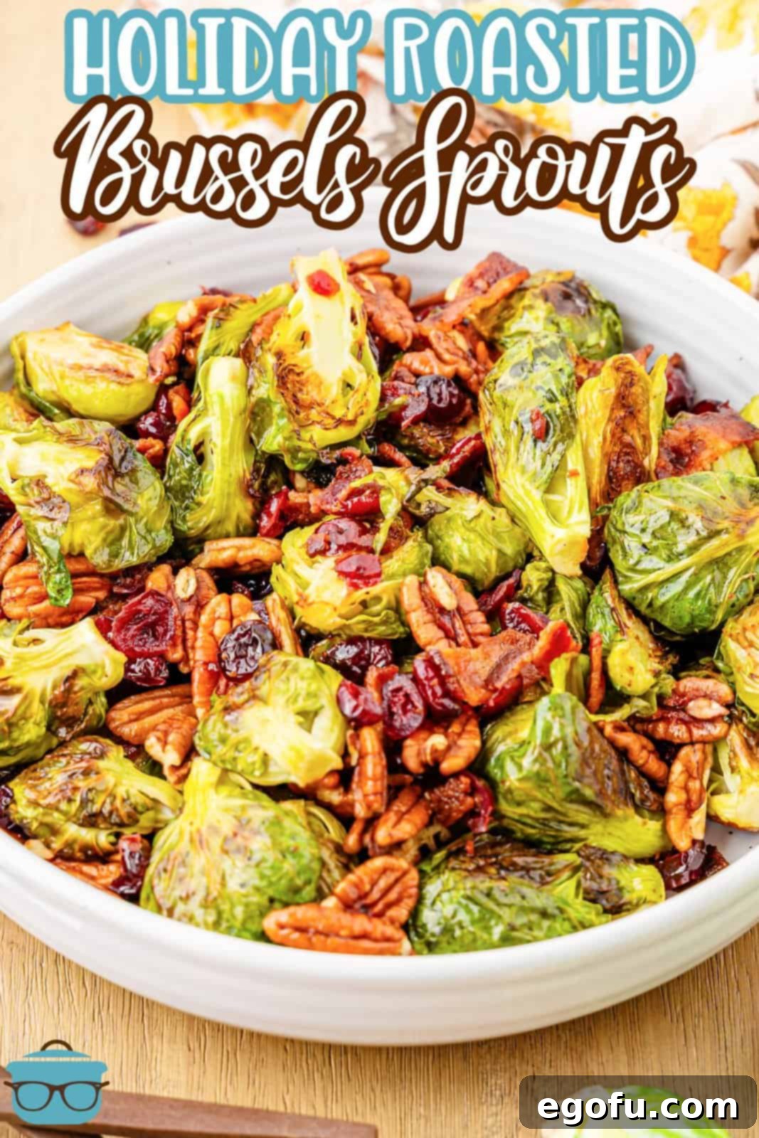 Crispy Holiday Brussels Sprouts 3 A large white serving platter brimming with freshly roasted Brussels sprouts, perfect for a holiday meal.