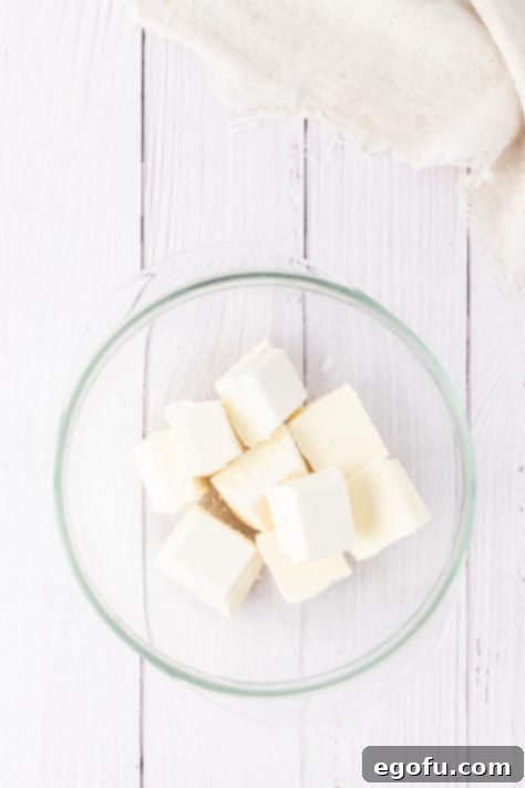 White chocolate waiting to be melted in a bowl.