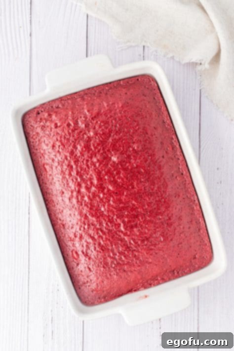 A red velvet cake in a baking dish.
