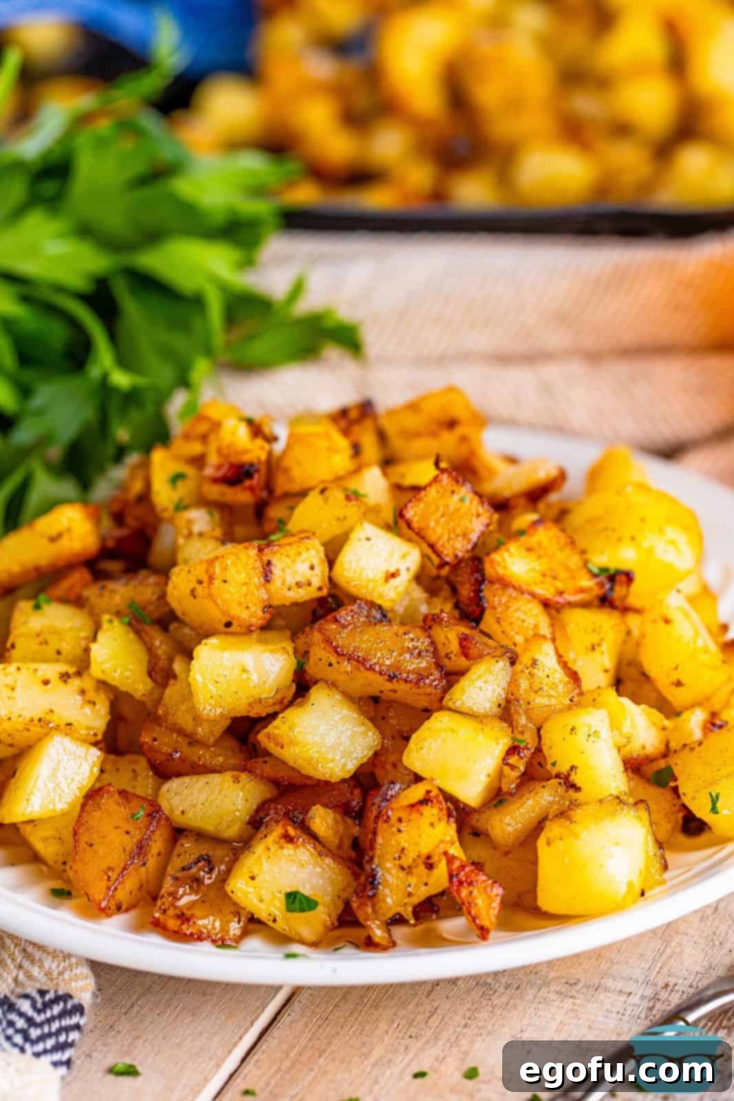 A plate with a mound of Southern Fried Potatoes 