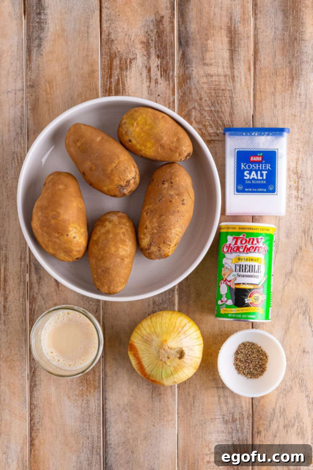 Bacon, russet potatoes, sweet onion, kosher salt, black pepper, creole seasoning and parsley.