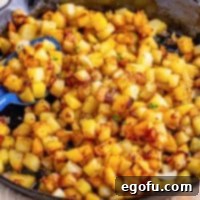 Close up looking at a pan of Southern Fried Potatoes.