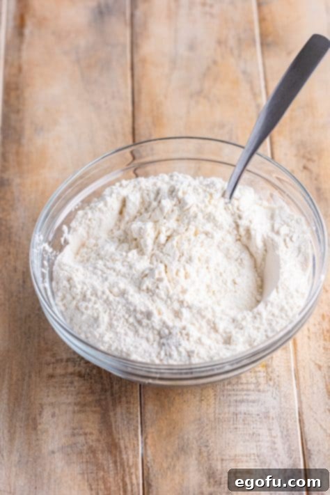 Flour and baking powder in a mixing bowl.