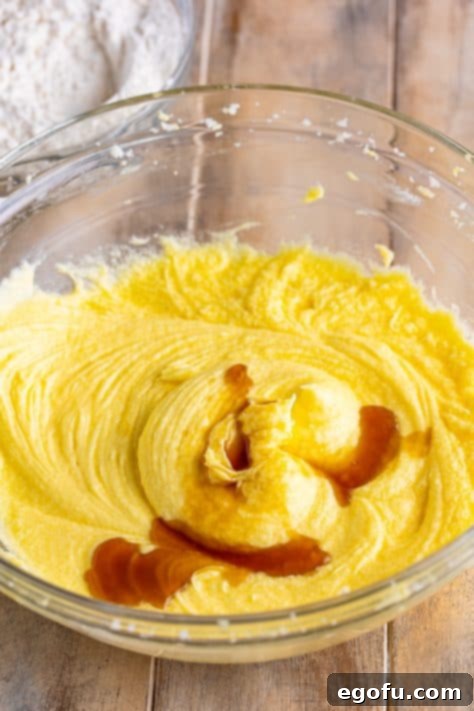 Vanilla extract on top of the wet ingredients of cake batter.