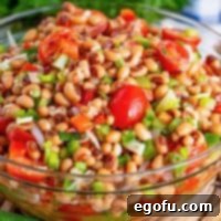 Zesty Black Eyed Pea Salad 9 Close up looking at a bowl of Black Eyed Pea Salad.