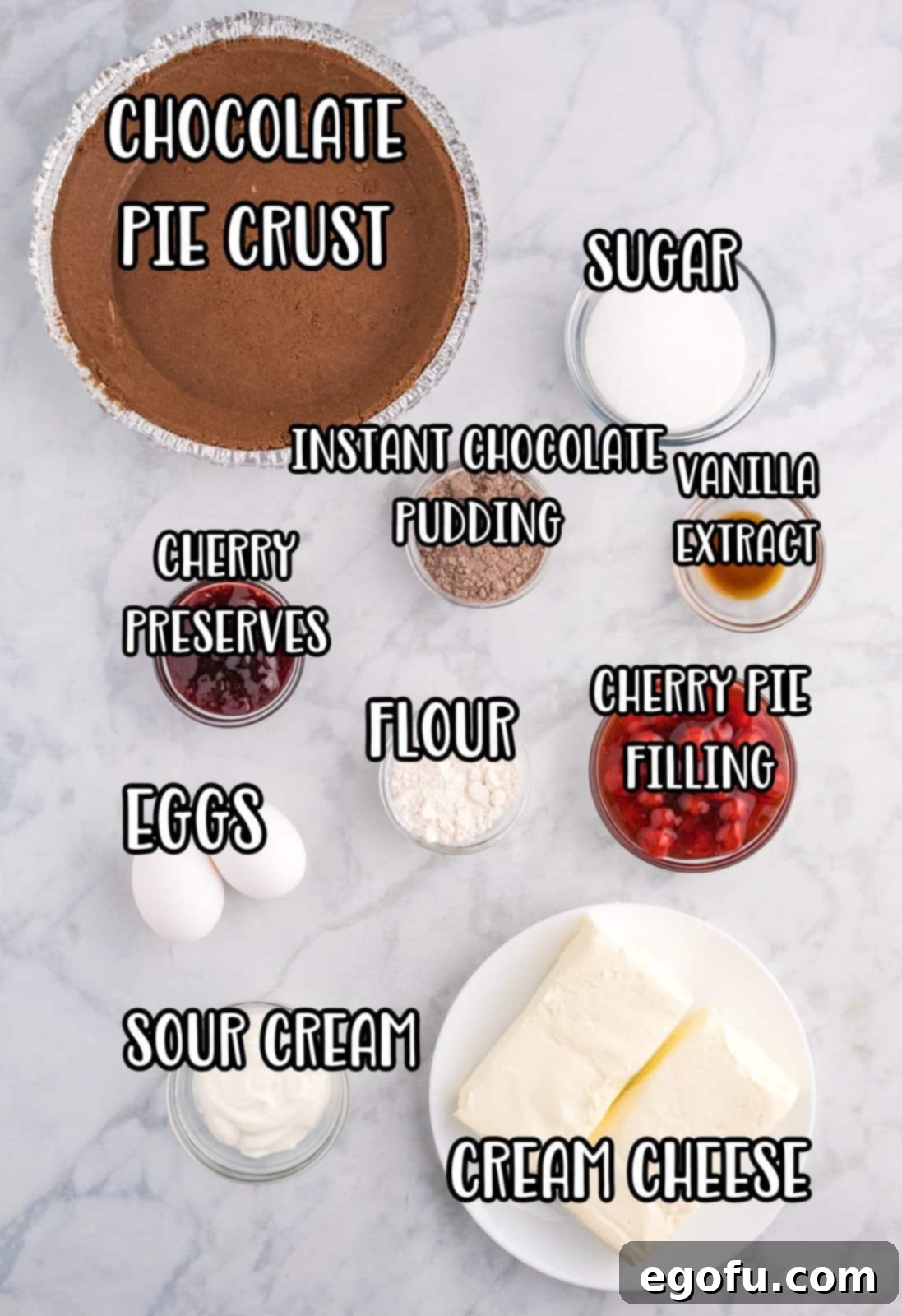 Decadent Cherry Chocolate Cheesecake 4 A vibrant flat lay image of all the Cherry Chocolate Cheesecake ingredients.