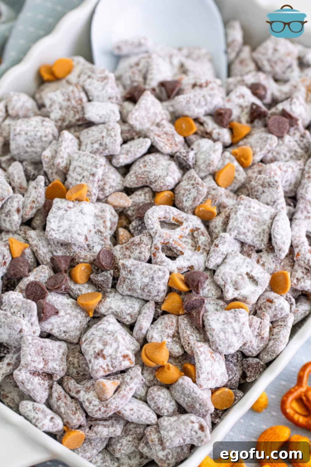 Looking down on a dish of Chex Mix Muddy Buddies.