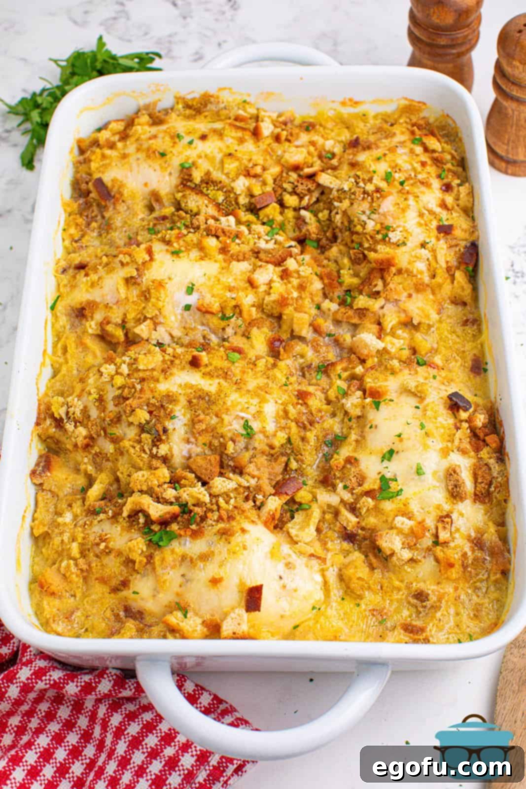 A freshly baked Swiss Chicken Casserole, bubbling hot and golden-brown, presented in a baking dish and ready to be served.