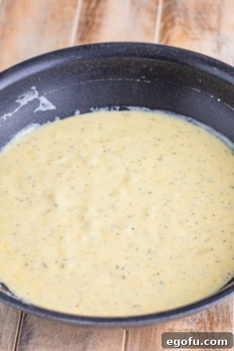 Shallot gravy mixture in a pan.