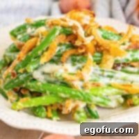 Close up looking at a large serving of Green Bean Casserole with no cream soups used.