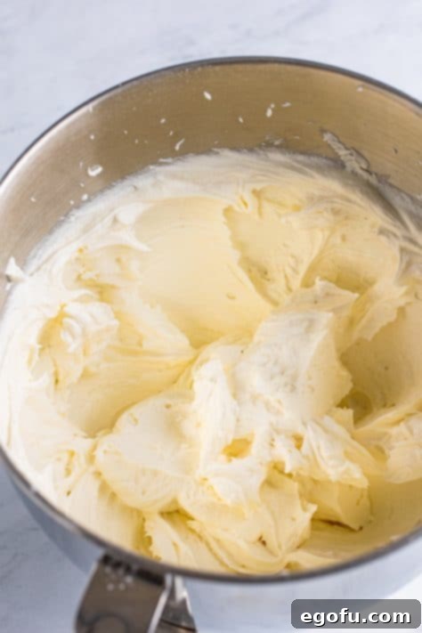 Bridal Bliss Bites 20 Fluffy buttercream frosting in a mixing bowl.