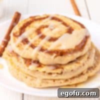 A plate of Cinnamon Roll Pancakes