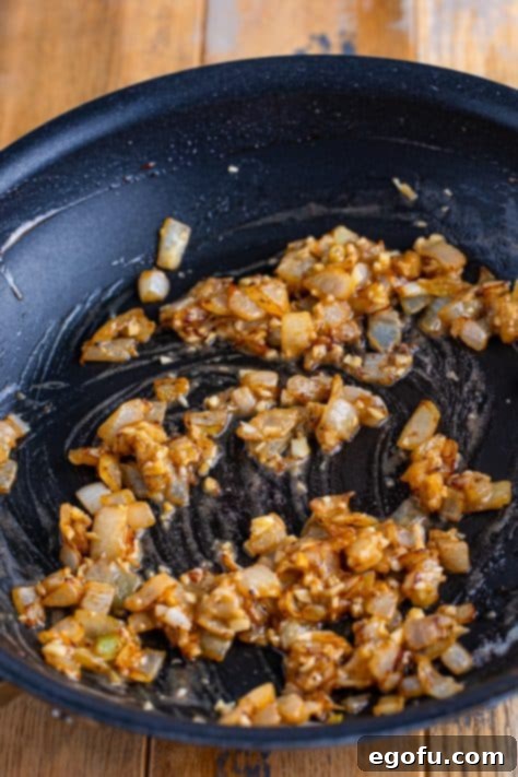 Velvety Chicken and Mushroom Feast 14 Garlic, onion, and flour in a skillet.