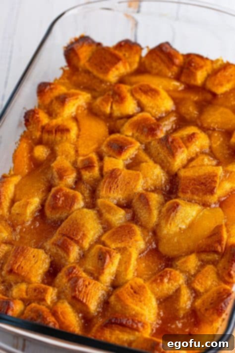 Fresh baked Peach Pie bubble up in a baking dish without the glaze.