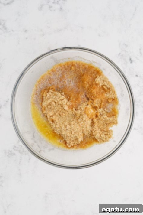 Nilla cookie crumbs and melted butter in a mixing bowl.