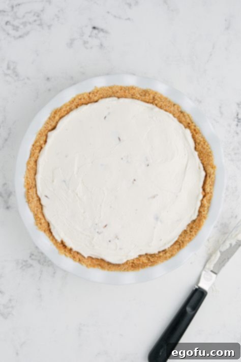 Filling mixture in a pie crust.