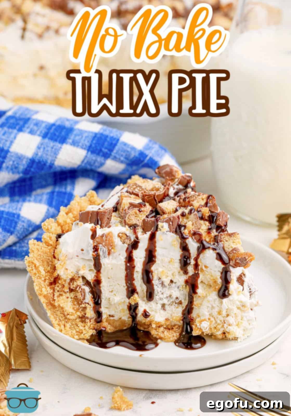 A slice of No Bake Twix Pie with chocolate drizzle.