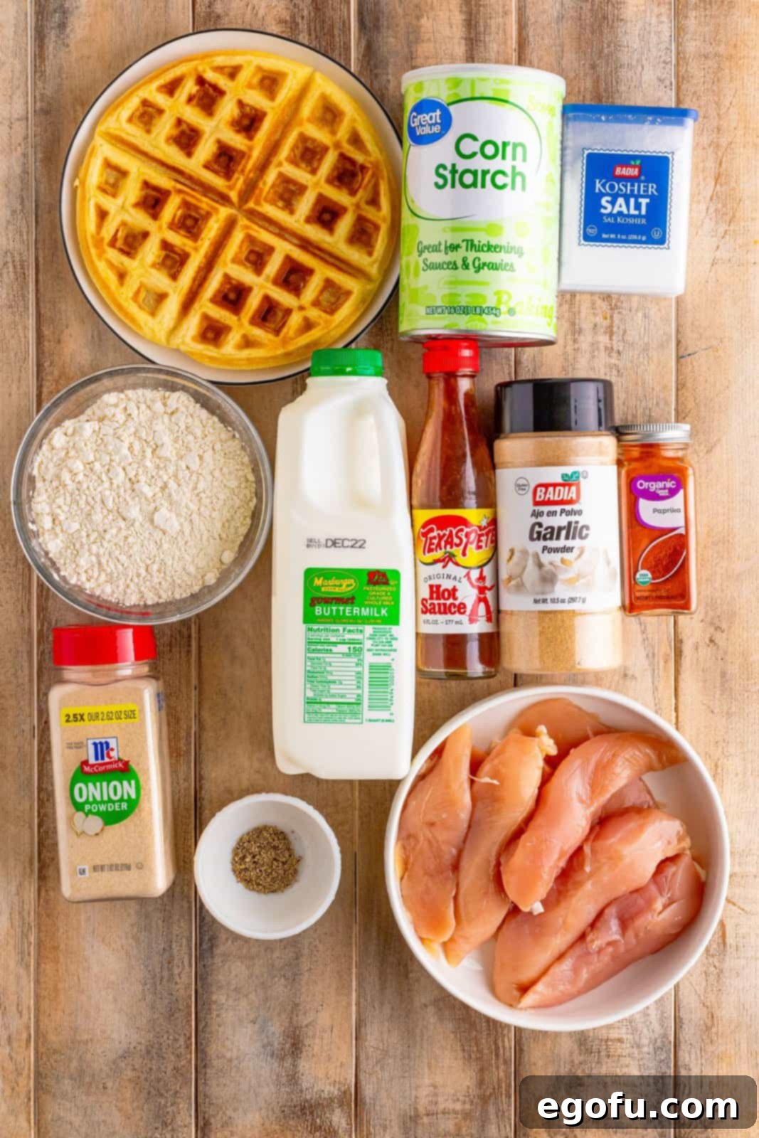 Chicken tenderloins, kosher salt, garlic powder, onion powder, paprika, black pepper, buttermilk, hot sauce, all purpose flour, corn starch, and peanut oil.