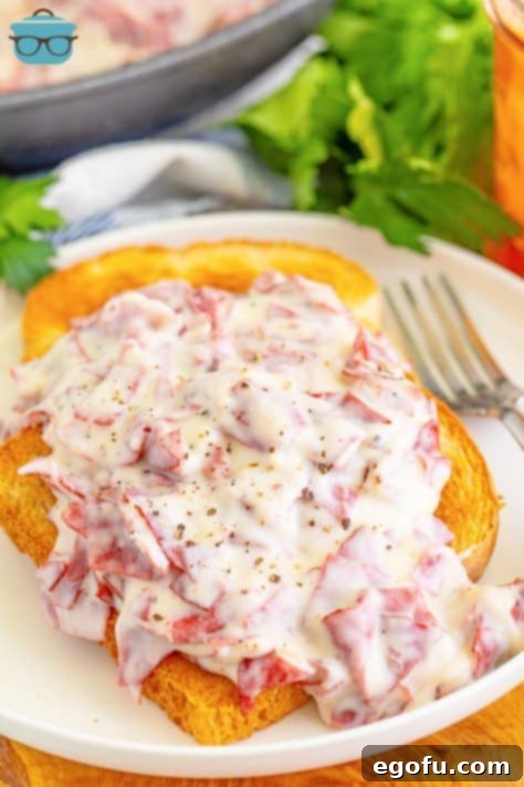 A plate with some Creamed Chip Beef on toast.