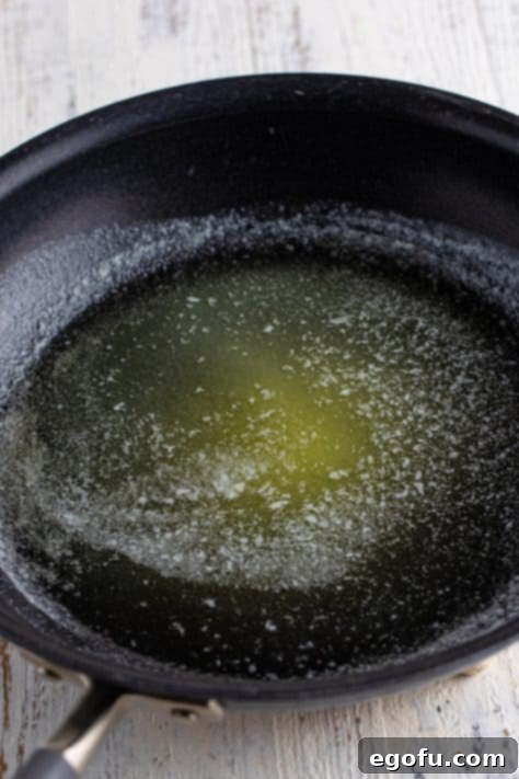 Melted butter in a saucepan.